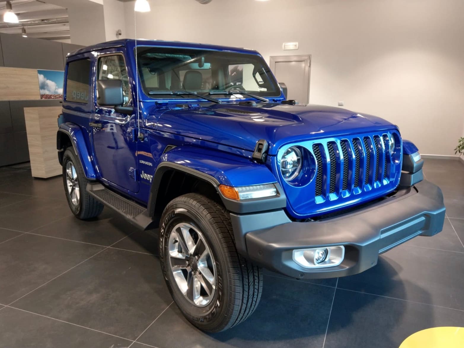 2022 Jeep Wrangler in Hydro Blue — photograph 3 of 3