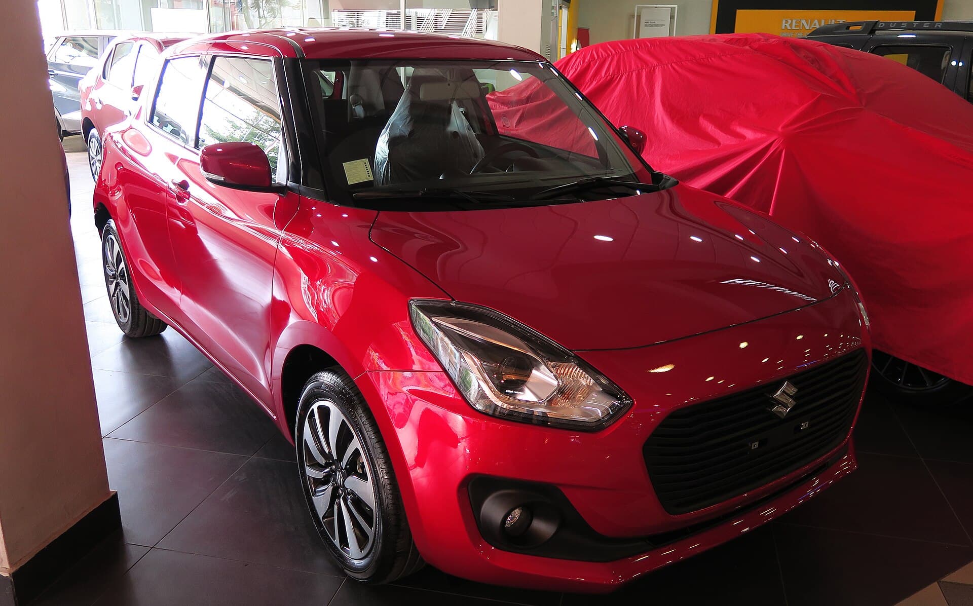 2020 Suzuki Swift in Burning Red — photograph 3 of 6